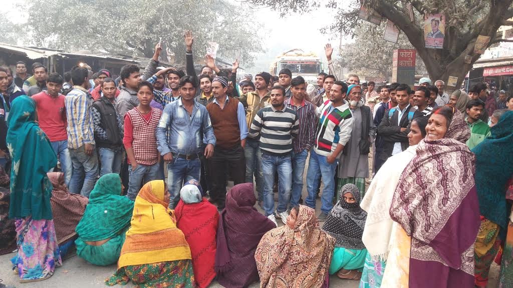 Queue of people beaten by police