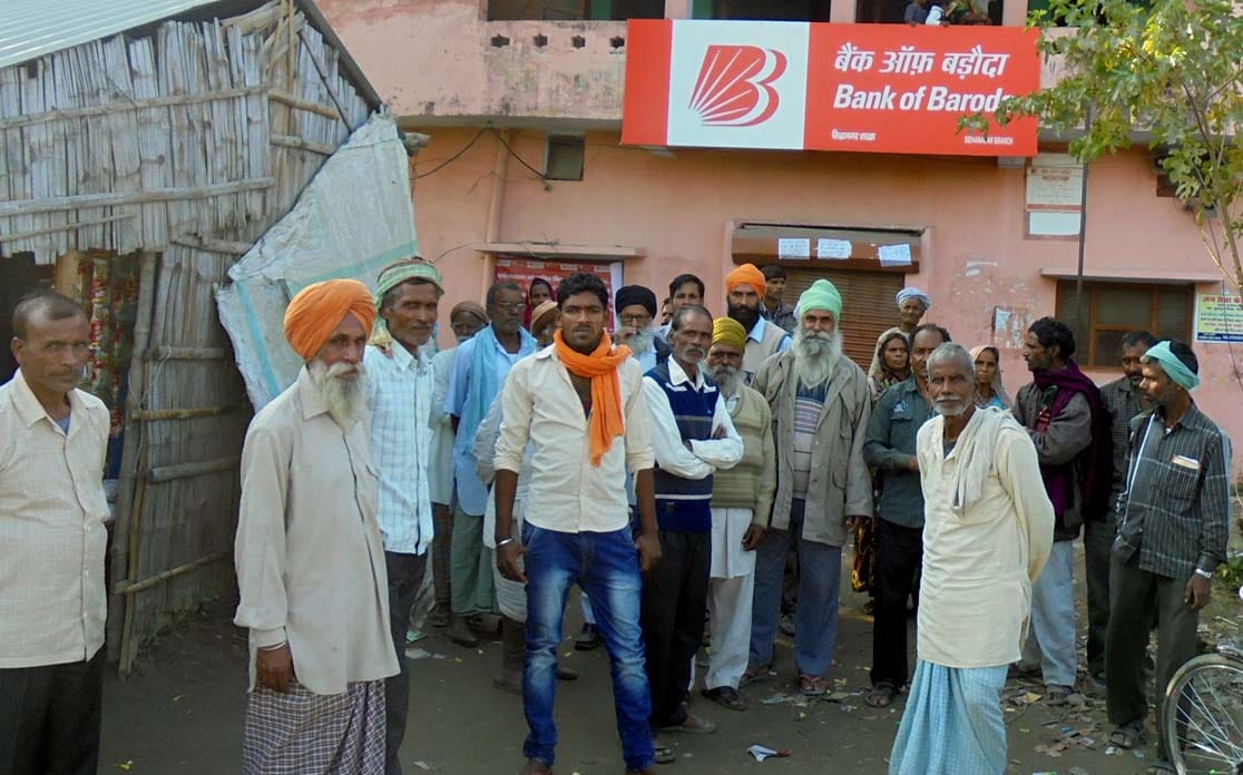 Cash on delays crowd erupted, assaulting employees