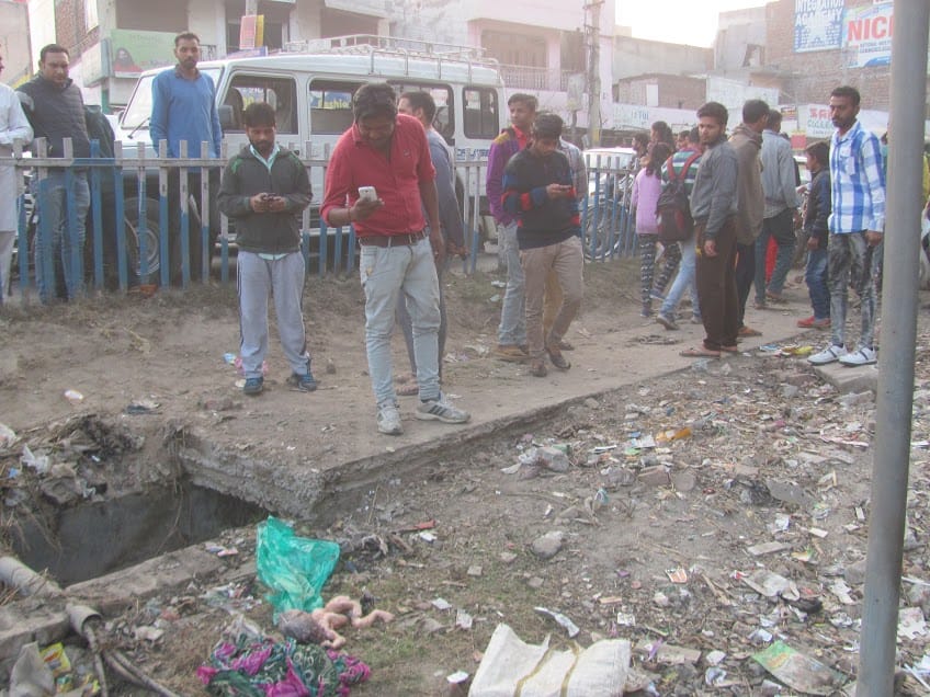 newborn baby thrown in the trash at Kurukshetra haryana