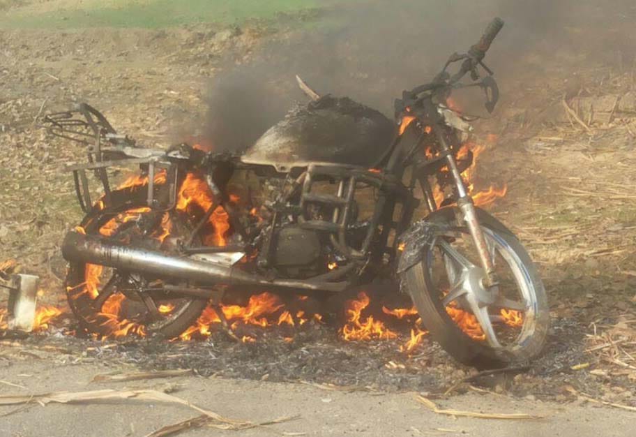 The mob set fire to the meat recovered from the damaged bike