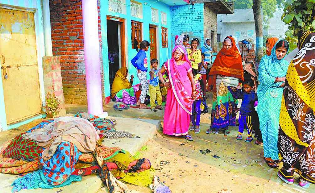 Woman killed in house fire, three admitted