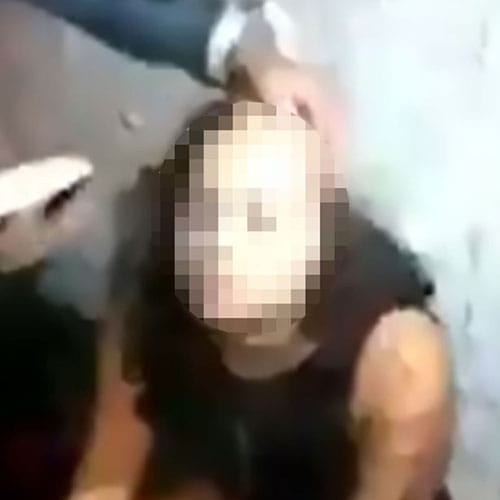 Gangster's girlfriend is forced to have her head shaved