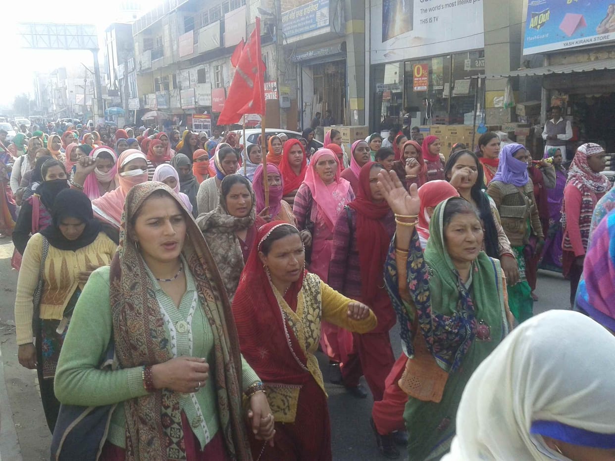 Mid-day meal workers perform