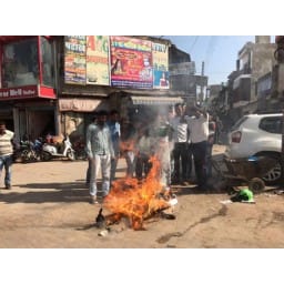 pm, statue, fire, congress, protest