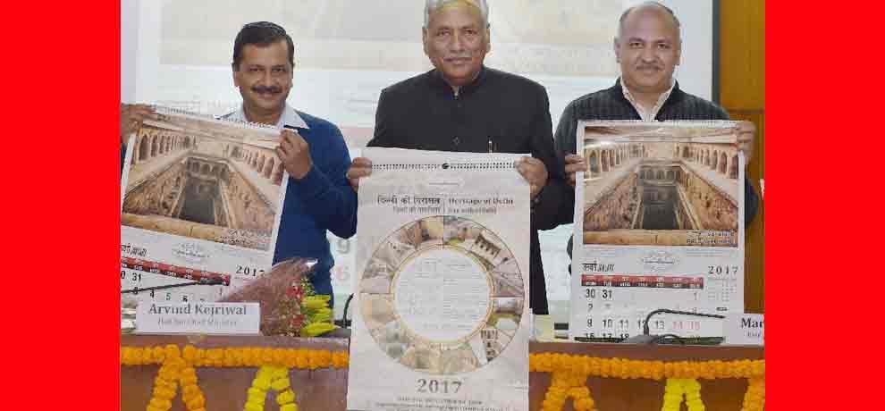 kejriwal hugs opposition leader vijendra gupta at calender launch in vidhansabha
