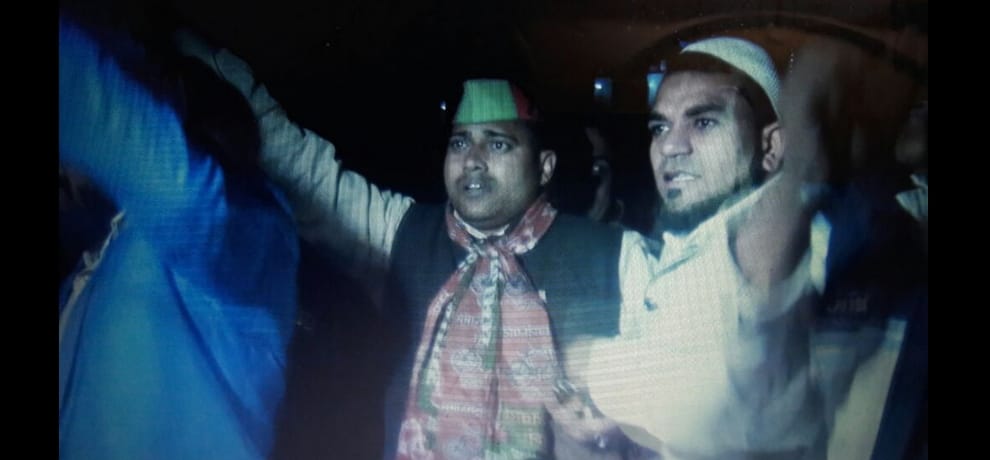 sp district president climbs water tank and warns, take back akhilesh or i will jump