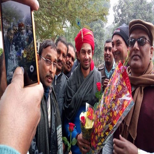 son of RJD Chief Lalu Yadav, Tej Pratap Yadav plays flute dressed as Krishna