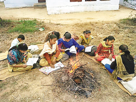 children shivering, reading in alav