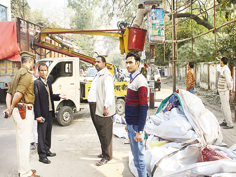 Hoardings, banners removed, cleaned intersection