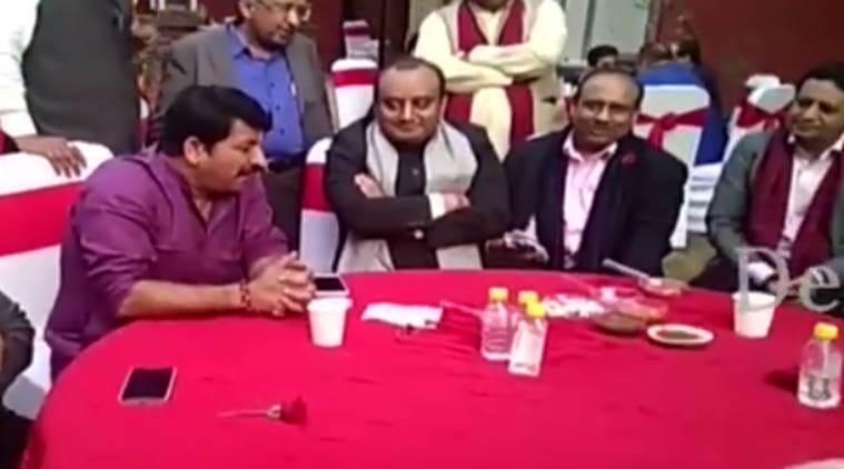 captured in video: bjp mp manoj tiwari making mockery of people in bank atm queue
