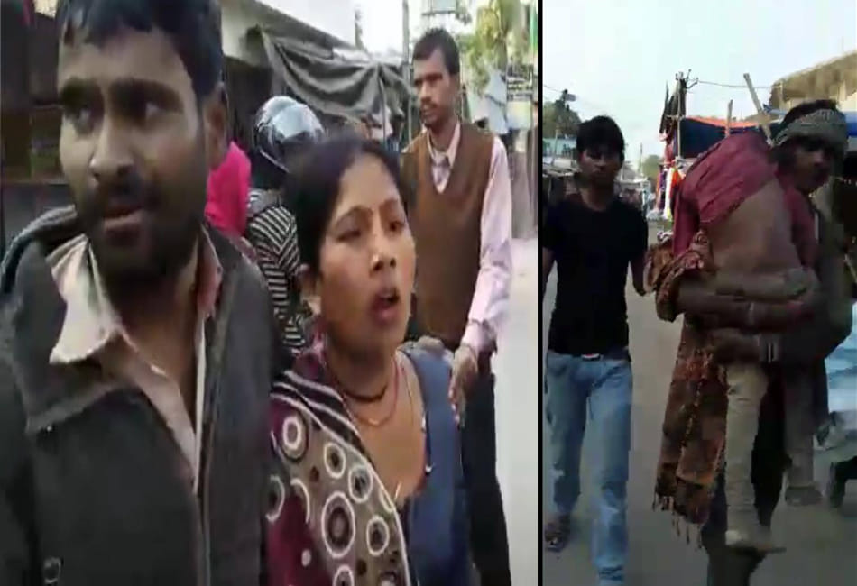 lack of ambulance sons body laid on the shoulder