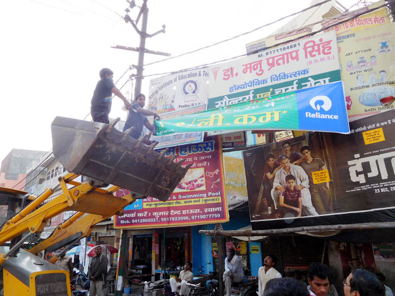 action taked against poster hordings