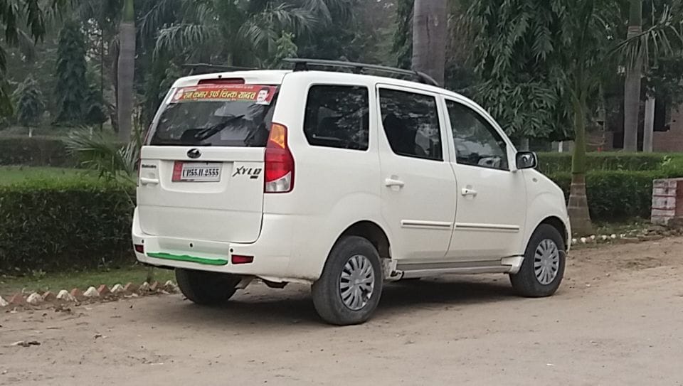 vehicle with sticker, flag running in collectorate 