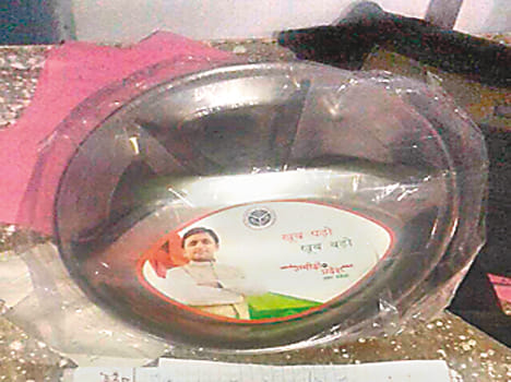 Akhilesh's photo plates were distributed to children