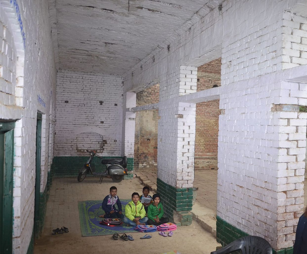 The frightened child shabby school buildings.