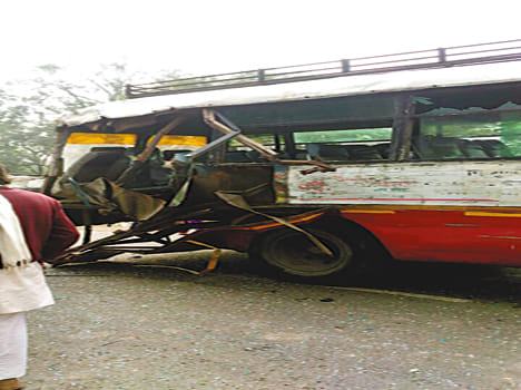 Roadways bus hit by truck, six injured