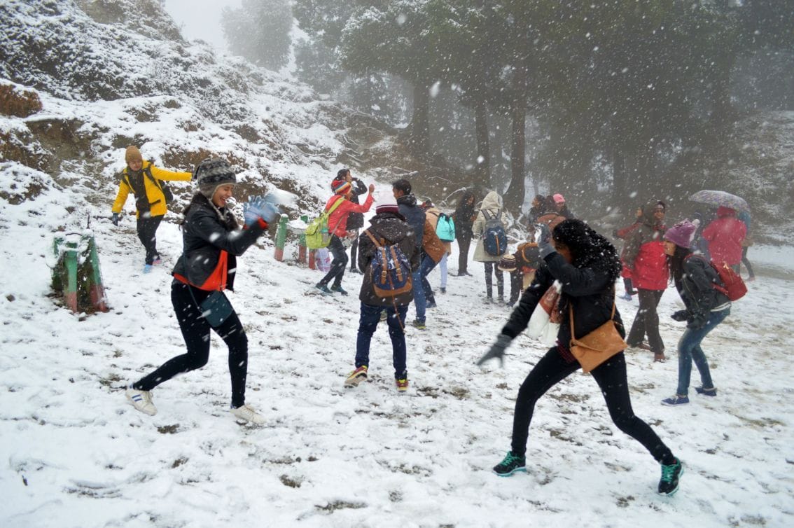 tourist became crazy after seeing snowfall