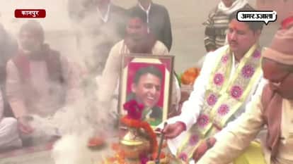  sp workers worship for patch up for akhilesh yadav and mulayam singh in samajwadi party dispute  