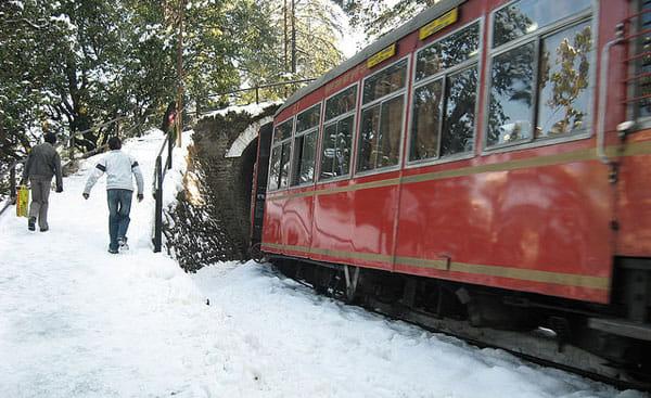 toy train stopped on the way to kalka-shimla track due to heavy snow fall and bad weather