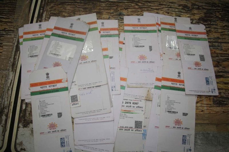 Dozens adhar cards found in garbage dumps
