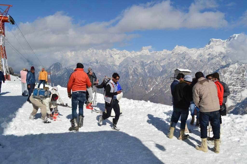 tourist enjoying skiing in auli.