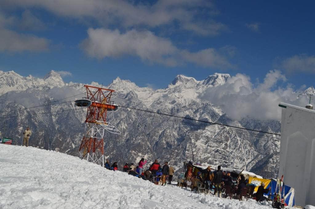 tourist enjoying skiing in auli.