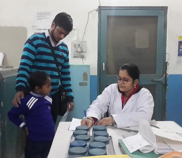 six years old girl left by father on railway station, no clothers on body and no footwears