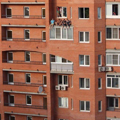 photos of some young people outside the window shows a horrible view