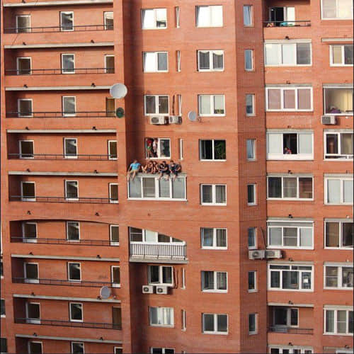 photos of some young people outside the window shows a horrible view