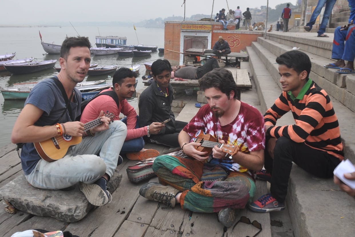 foreigner muscian play music at the bank of holy gana