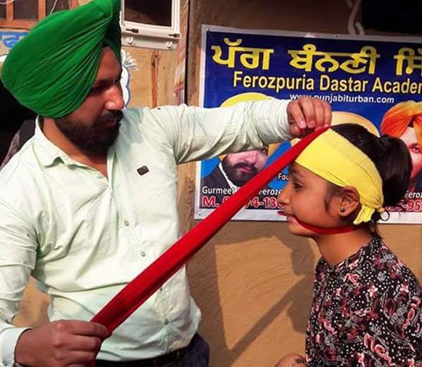 unique sikh boy and world record owner manjit singh, who tied turban on running bullet, 