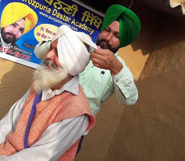 unique sikh boy and world record owner manjit singh, who tied turban on running bullet, 