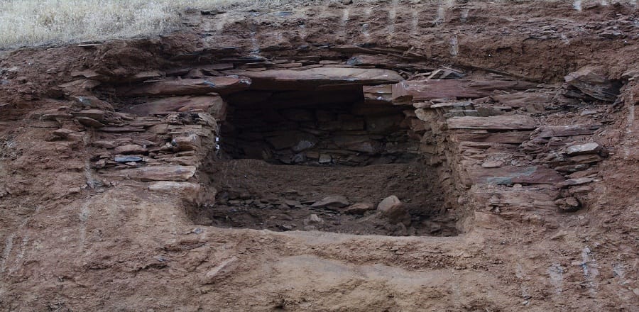 a woman's body removed from grave.