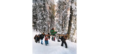 Village people walk 20 km on snow covered road to help old man to reach hospital