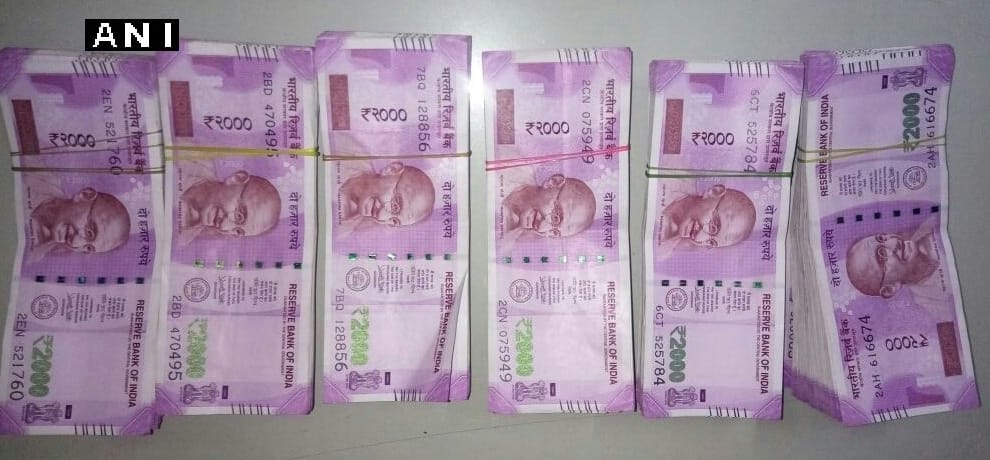 Seized Rs 2.85 lakh recovered from the car dealer