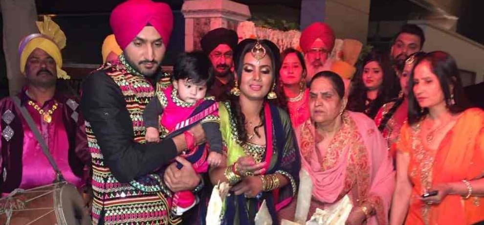 Harbhajan singh and Geeta basra celebrated lohri with daughter Hinaya