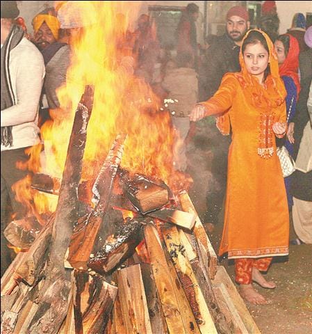 Lohri is celebrated by singing and dancing to drum Ngadhaen