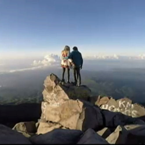 boyfriend propose his girlfriend at the top of volcano
