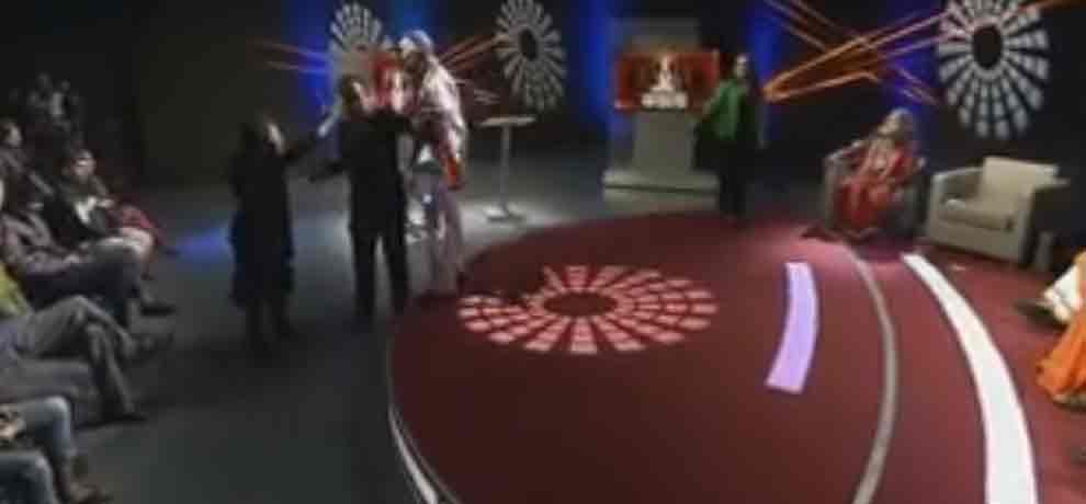 assaulting on swami om with the audience in the channel program