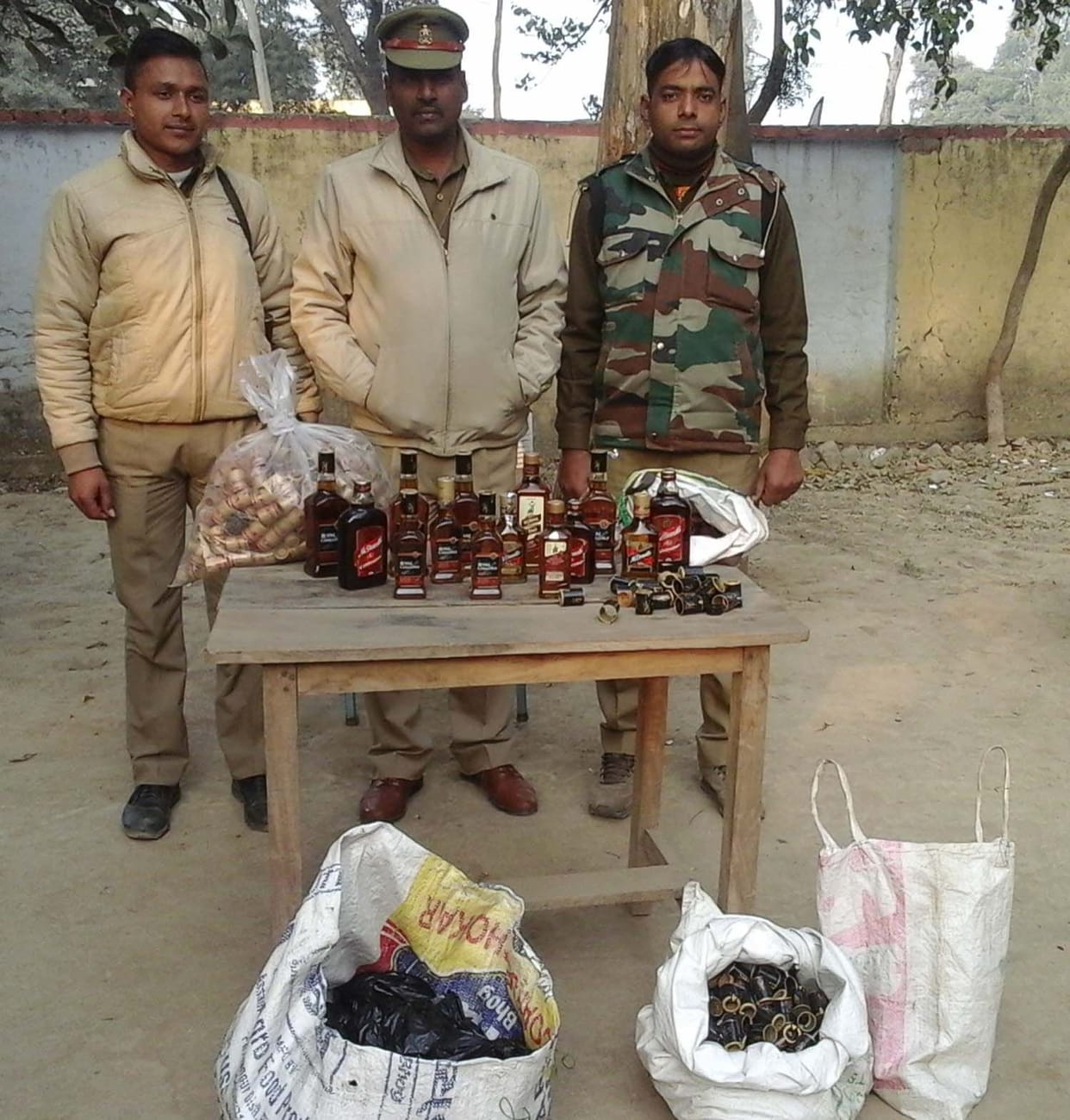 77 botals of wine found and one arrested