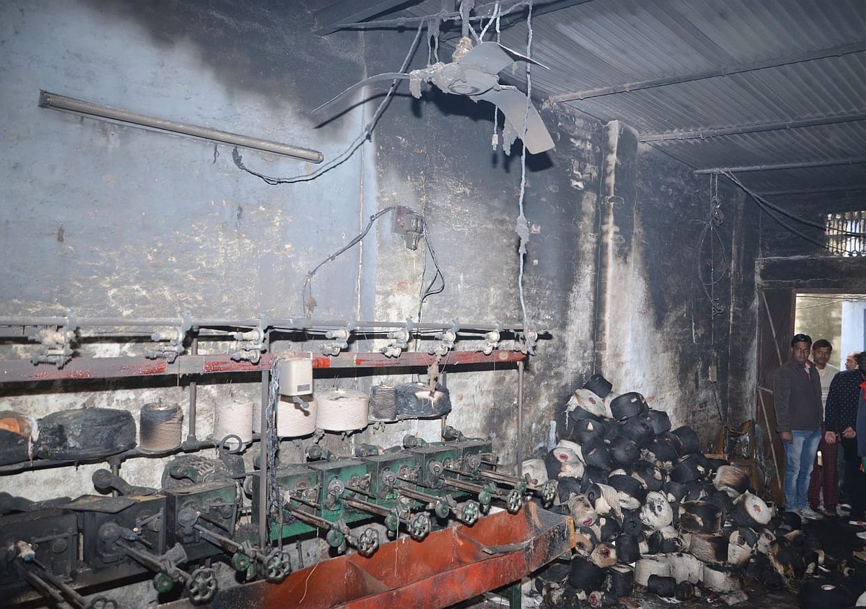 Short circuit in handloom factory fire.