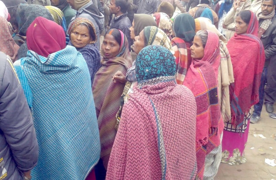 Bank unconscious woman in the line of