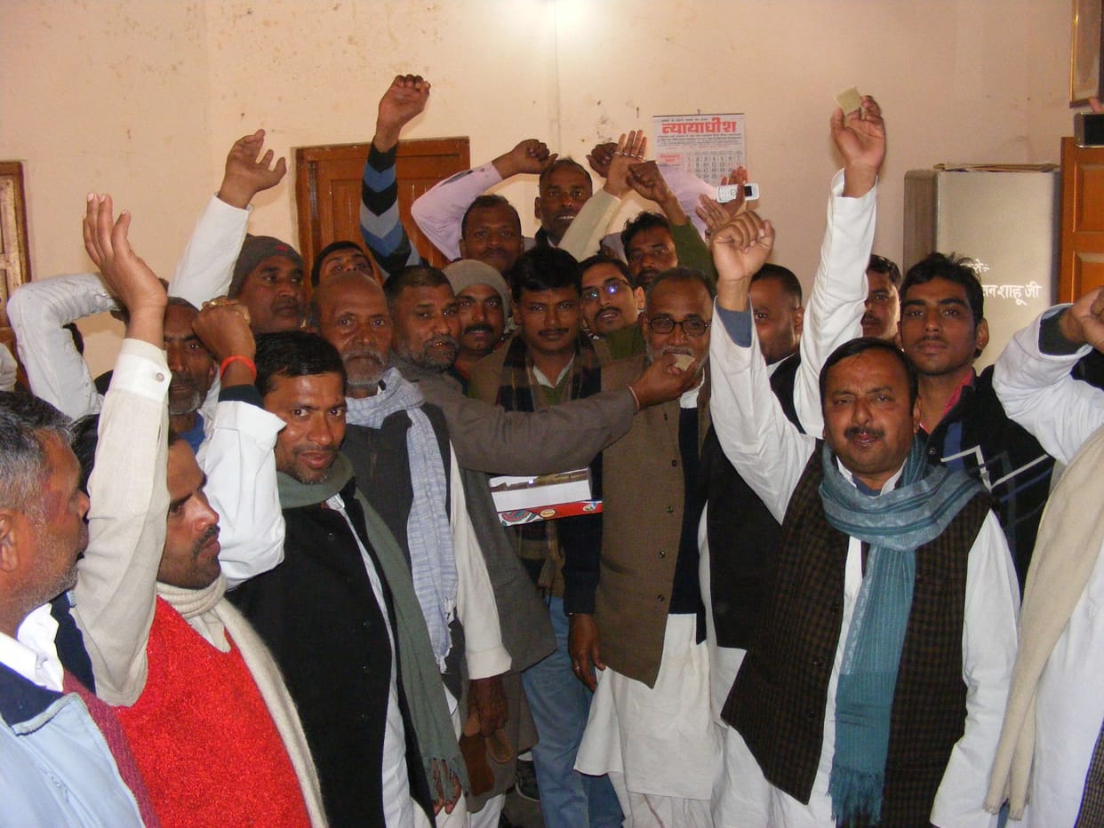 Activists distributed sweets to celebrate celebrated