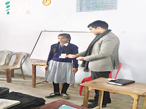 Students planted prospective voter sticker