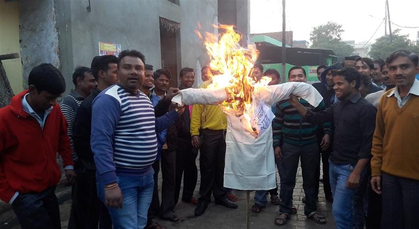  BJP protests, burnt effigies in town ammunition