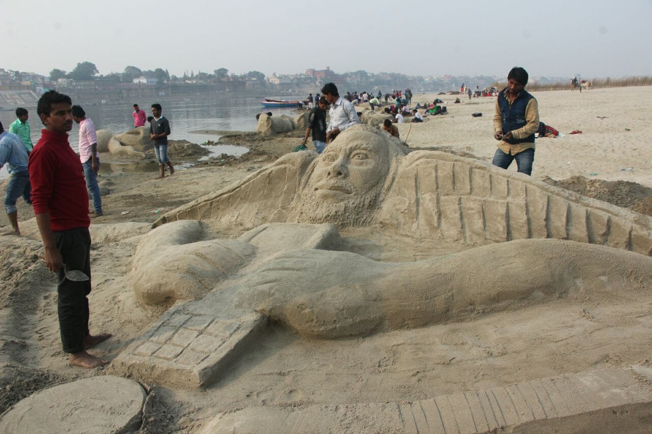sand artist makes various art on ganga sand at varanasi