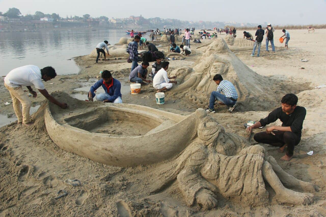 sand artist makes various art on ganga sand at varanasi