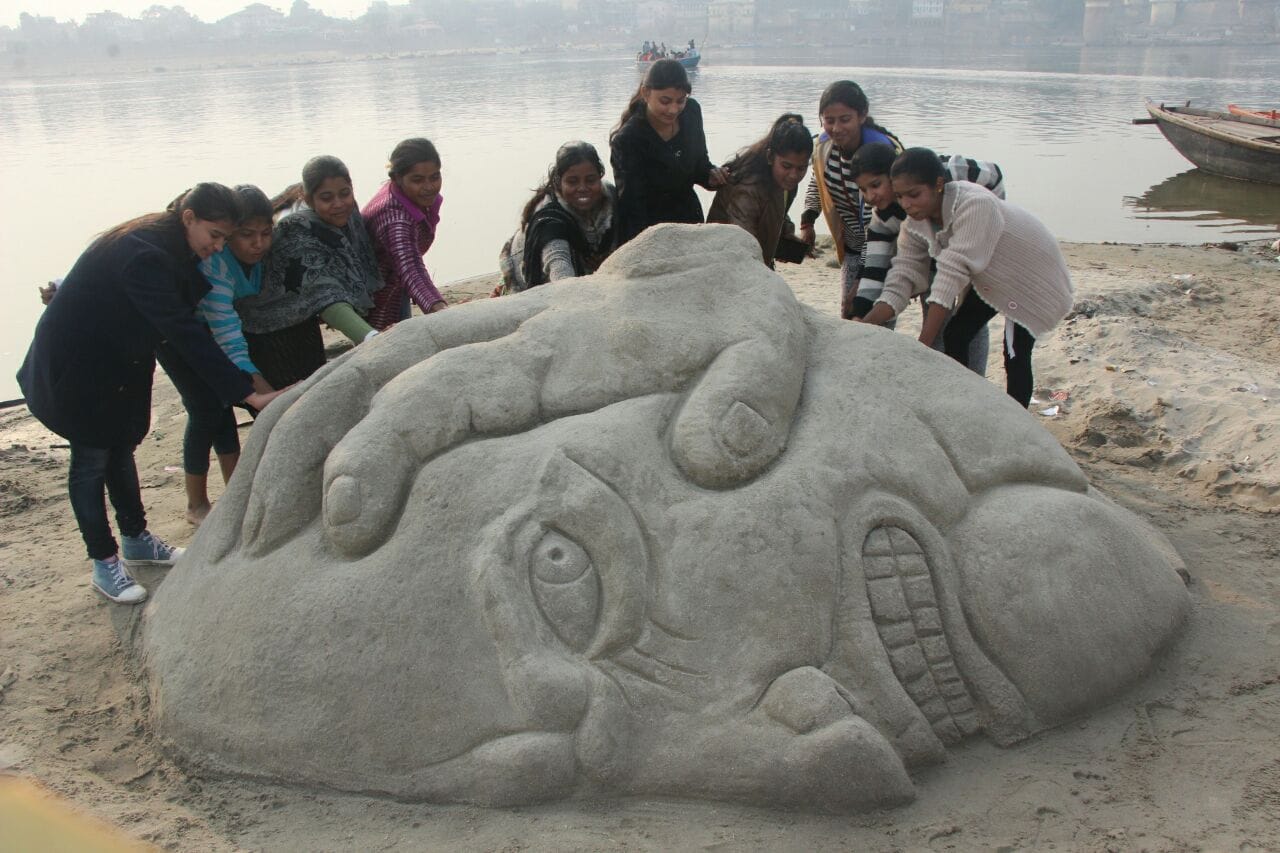 sand artist makes various art on ganga sand at varanasi
