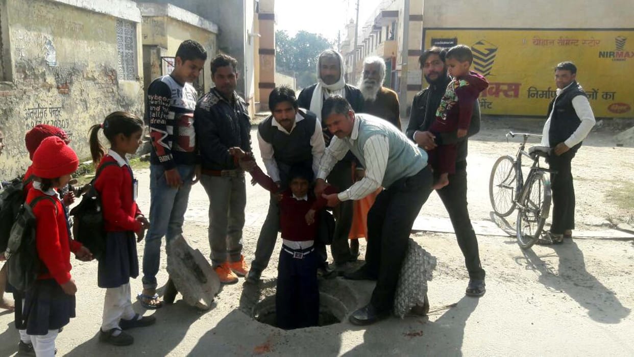 Student injured by falling into manhole.