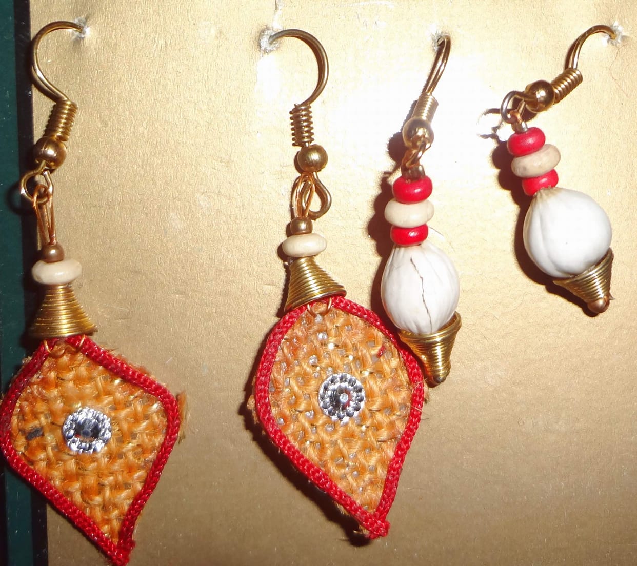 Reetha bracelet, locket will be the seeds of Gulmohar.